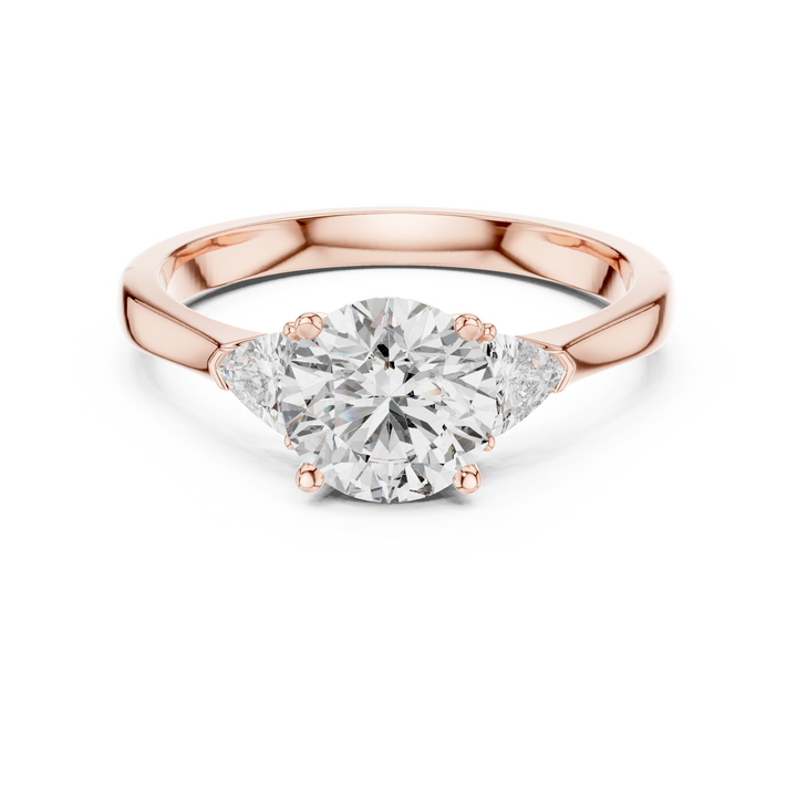Round Cut Diamond Three Stone Ring with Trillion Side Accents