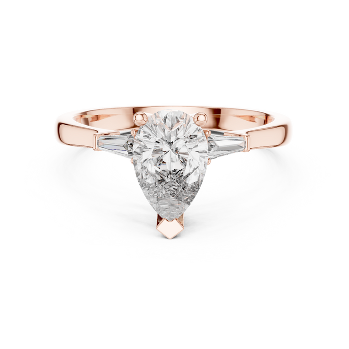 Pear Cut Diamond Three Stone Ring with Tapered Baguette Accents