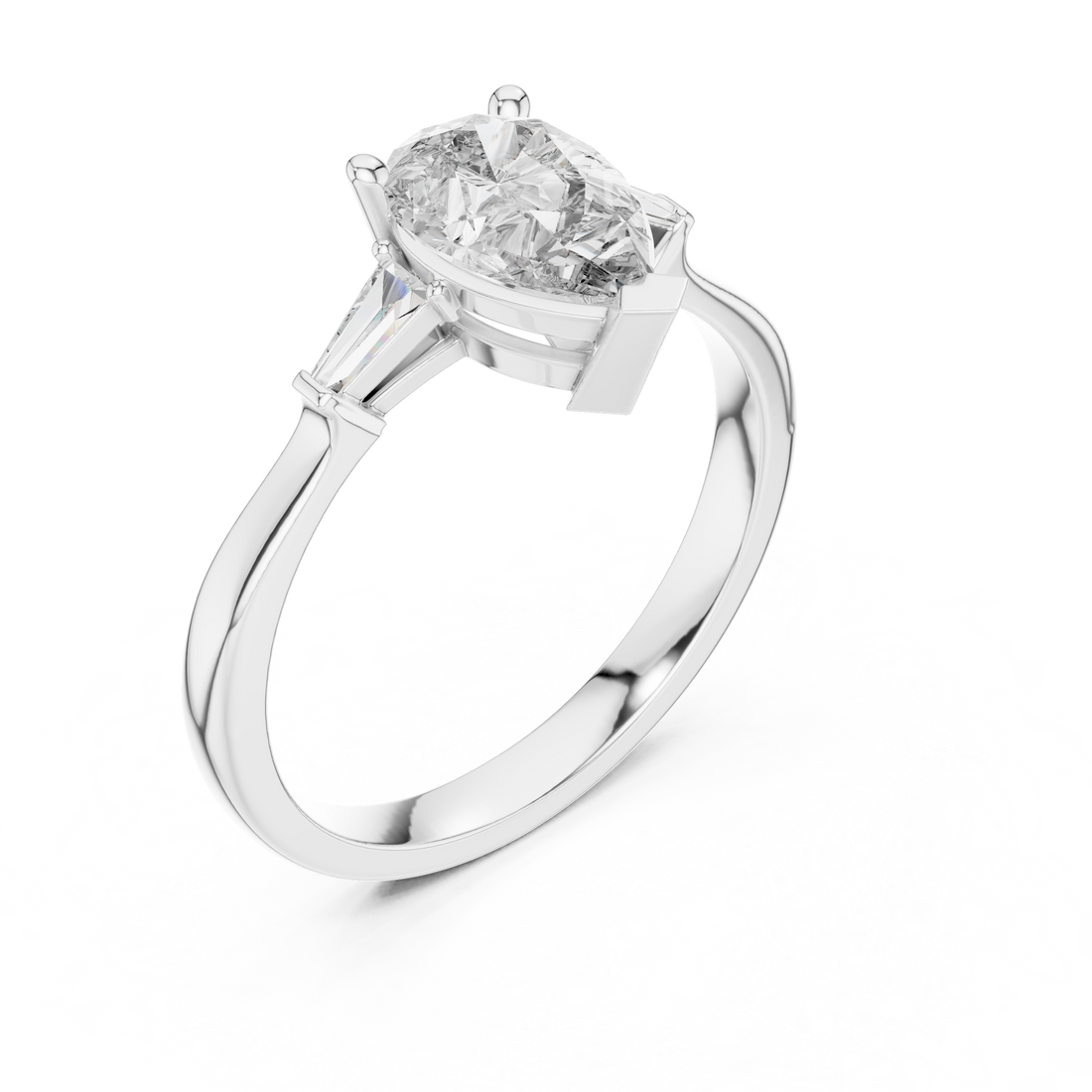 Pear Cut Diamond Three Stone Ring with Tapered Baguette Accents