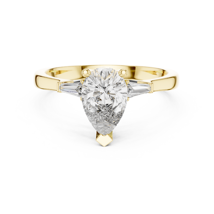 Pear Cut Diamond Three Stone Ring with Tapered Baguette Accents