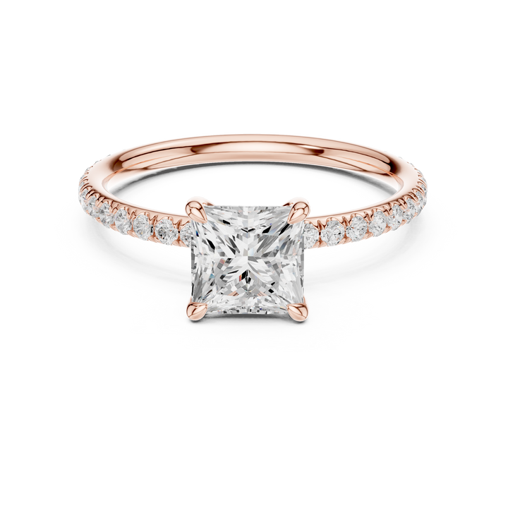 Floral pattern ring with carved detail.