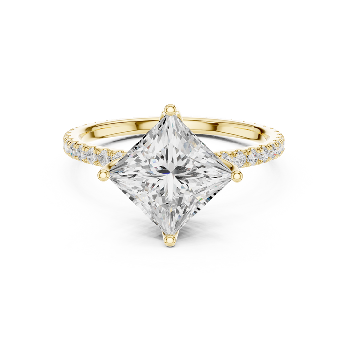 Gold engraved toe ring with floral pattern.