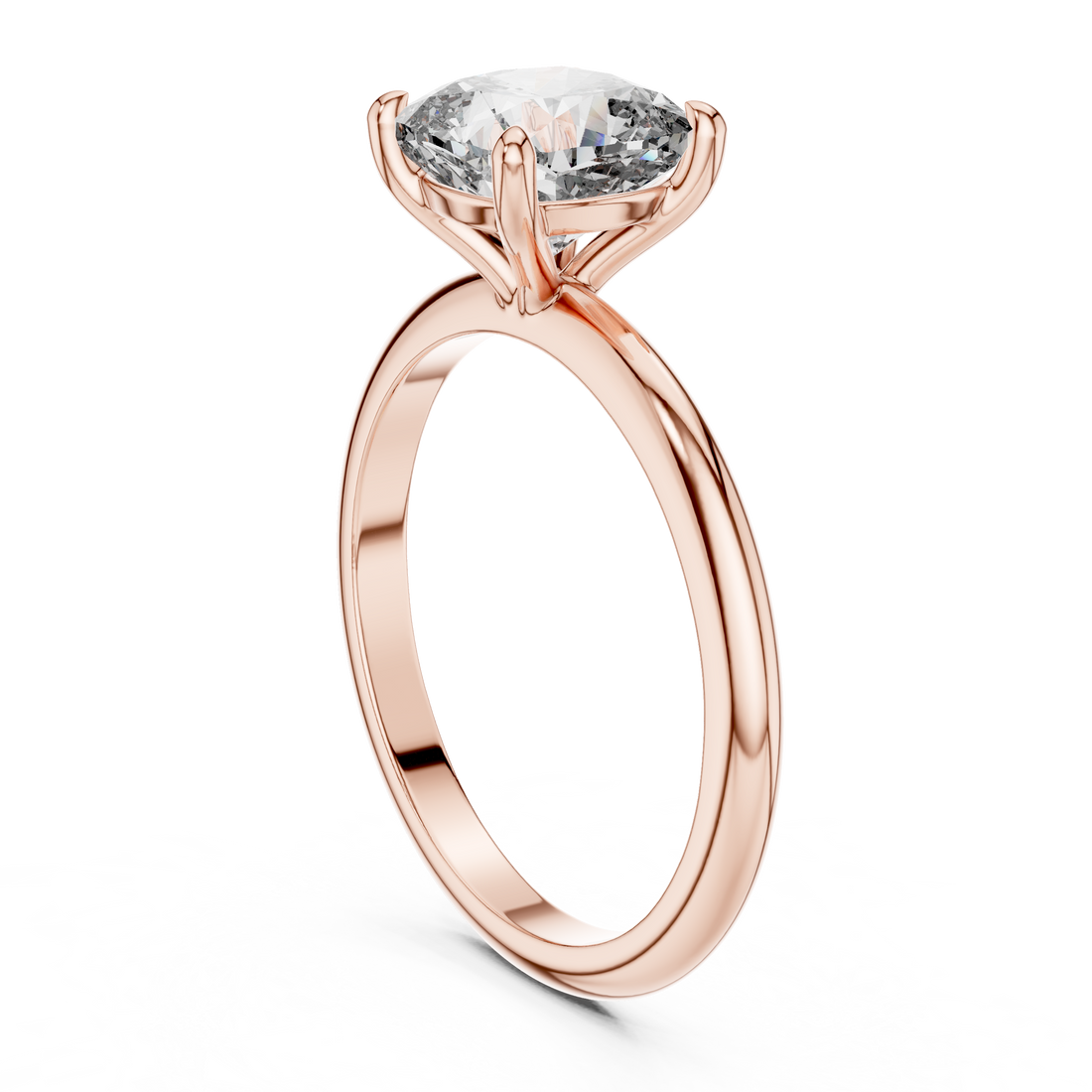 Gold toe ring with engraved floral detail.