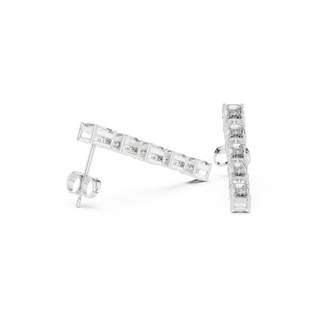 Close-up of emerald cut diamond linear drop earrings linked station detail