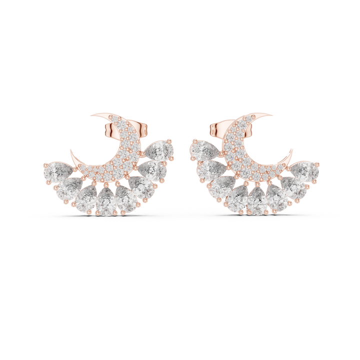 Crescent moon diamond stud earrings with pear drop cluster