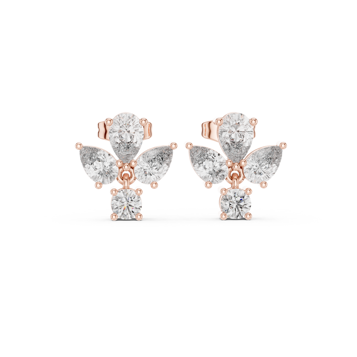 Pear and round diamond cluster drop stud earrings in white gold