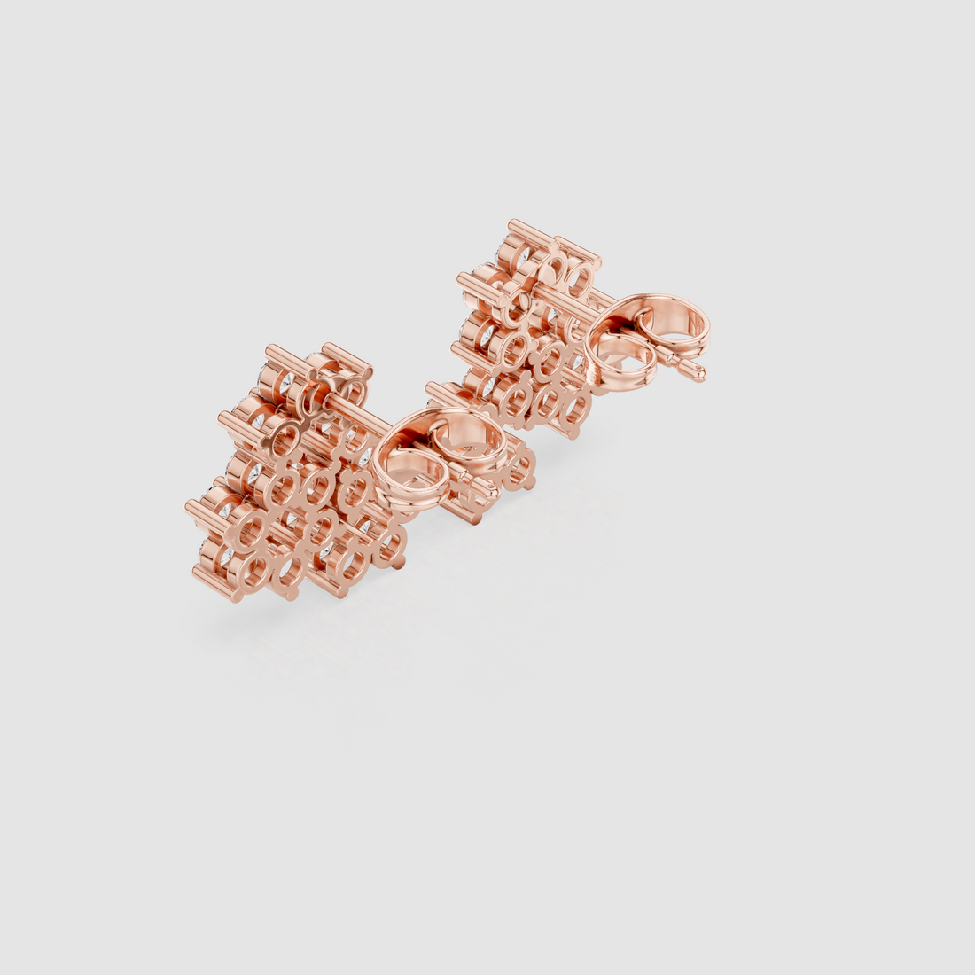 Minimalist tiny stud earrings with subtle sparkle and lightweight design.
