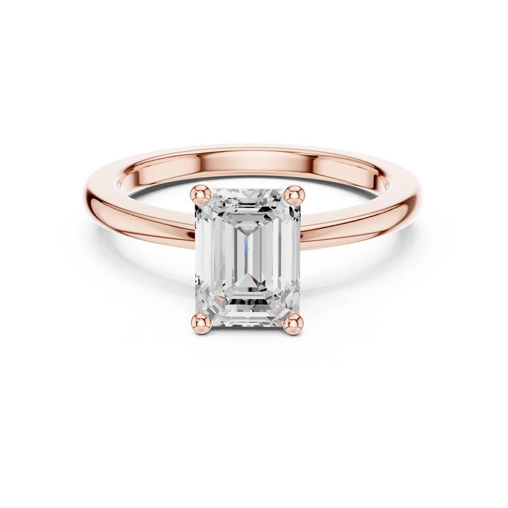Sparkling Emerald Cut Diamond Solitaire Engagement Ring in Classic Four Prong Setting close-up accent detail