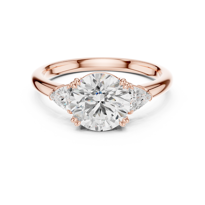Timeless Round Cut Diamond Three Stone Ring with Trillion Side Diamonds accent stones classic look