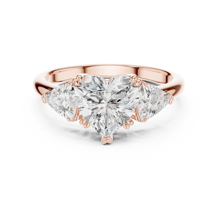Sparkling Heart Cut Diamond Three Stone Engagement Ring with Trillion Side Diamonds close-up accent detail