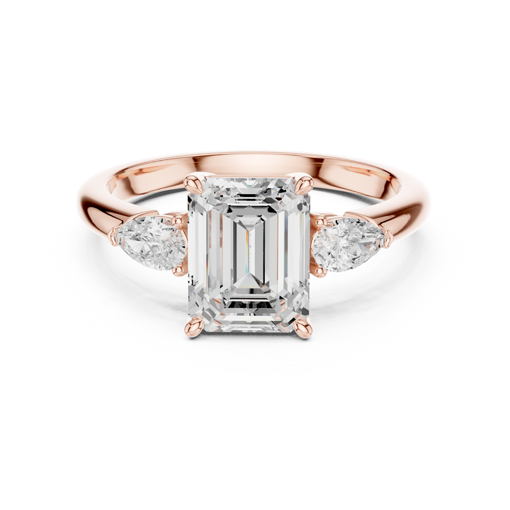 Emerald Cut Diamond Three Stone Ring with Pear Side Diamonds