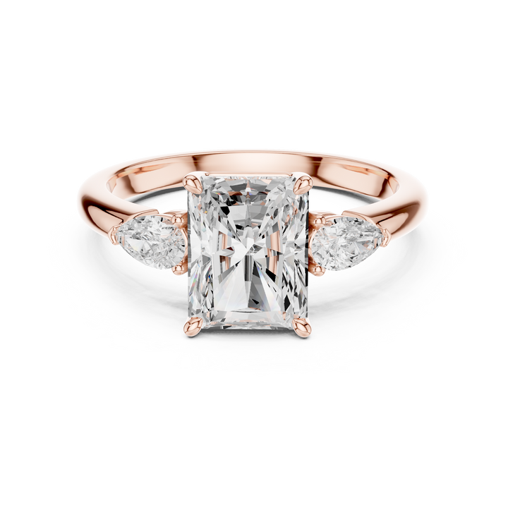 Radiant Cut Diamond Three Stone Ring with Pear Side Diamonds