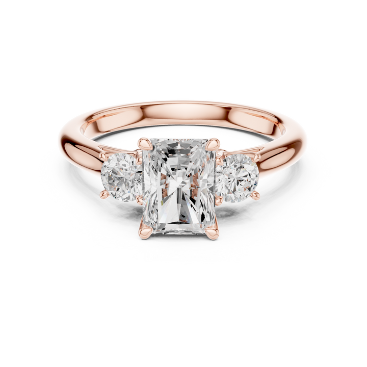 Sparkling Radiant Cut Diamond Three Stone Ring with Round Brilliant Side Diamonds close-up accent detail