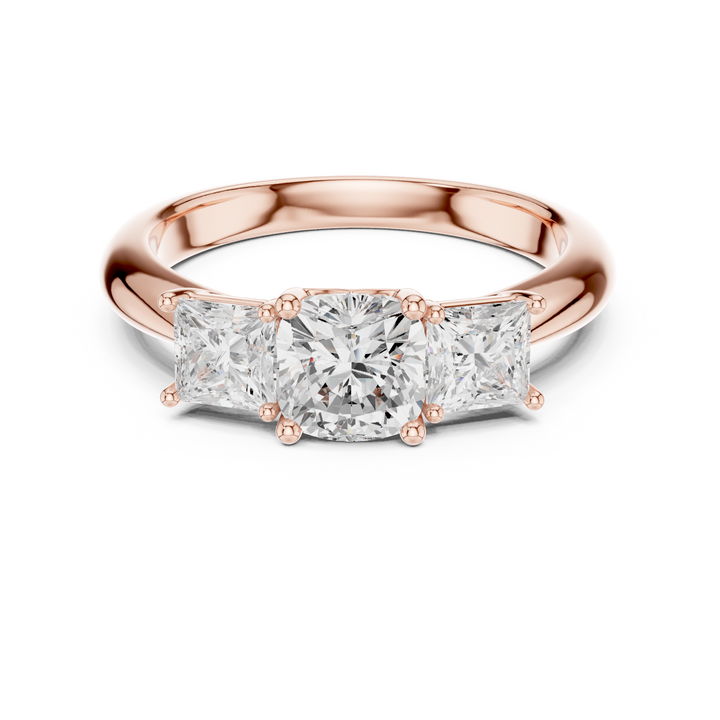 Sparkling Cushion Cut Diamond Three Stone Ring with Princess Cut Side Diamonds close-up accent detail