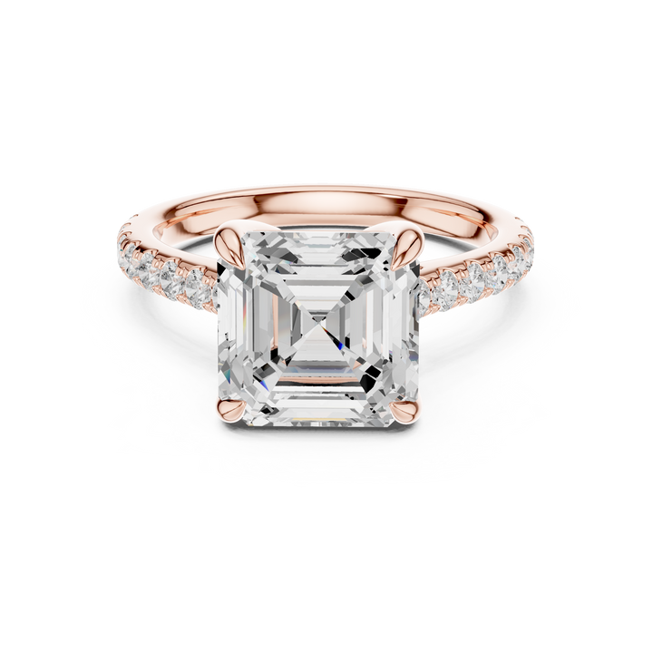 Elegant princess-cut diamond engagement ring with brilliant center stone and slim polished gold band.
