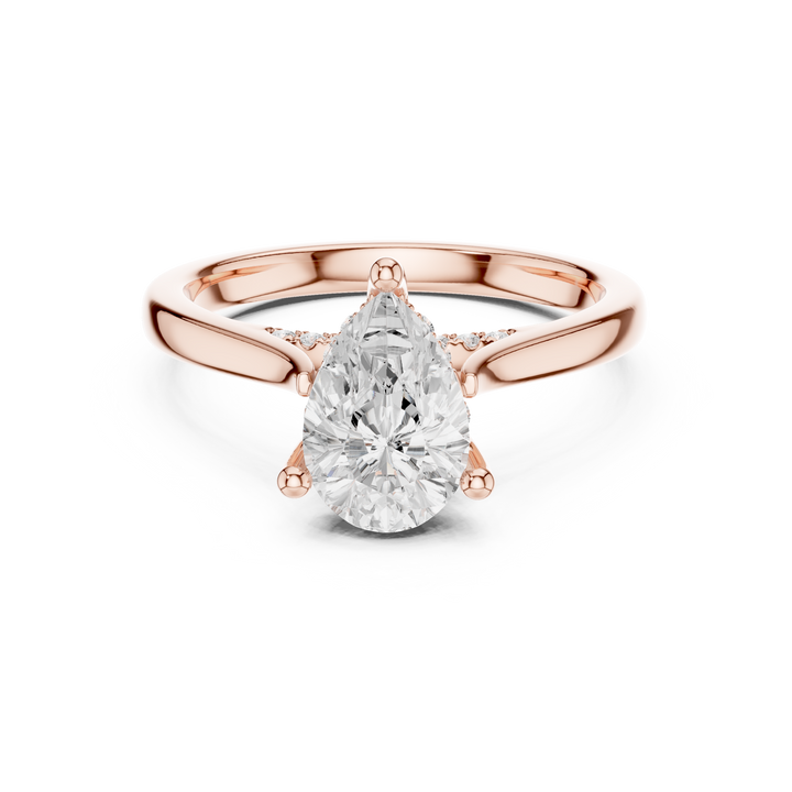 Pear Cut Diamond Solitaire Ring with Pavé Side Stones