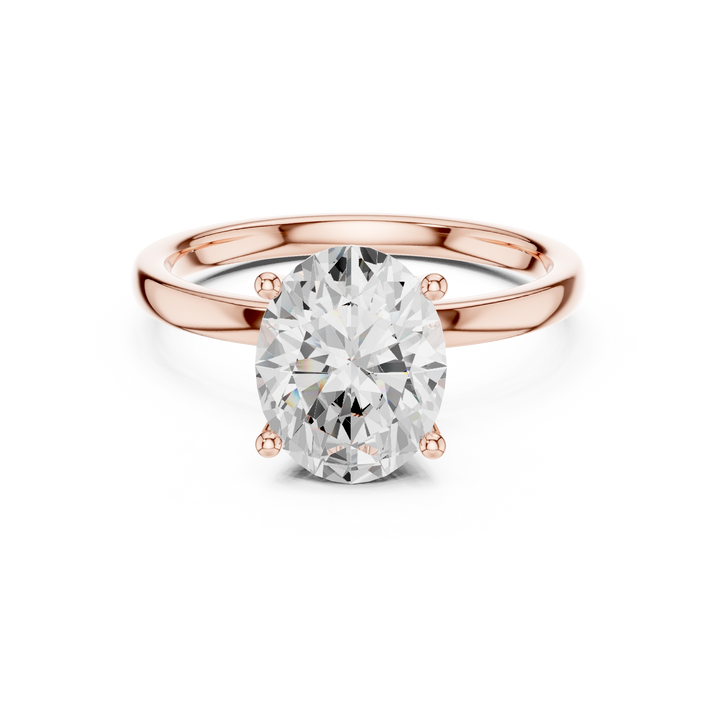 Timeless Oval Cut Diamond Solitaire Engagement Ring with Hidden Accent Diamonds accent stones classic look