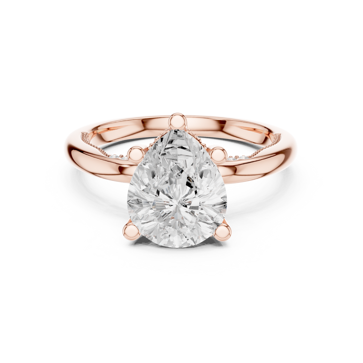 Sparkling Pear Cut Diamond Solitaire Engagement Ring with Hidden Halo close-up accent detail