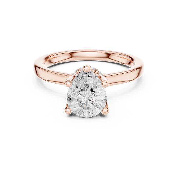 Sparkling Pear Cut Diamond Solitaire Engagement Ring with Hidden Accents close-up accent detail