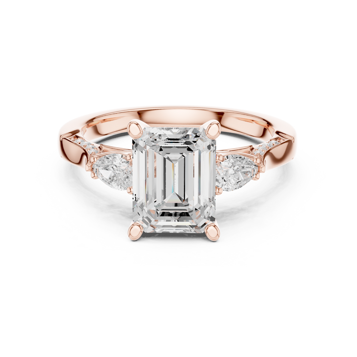 Timeless Emerald Cut Diamond Ring with Pear Side Stones accent stones classic look