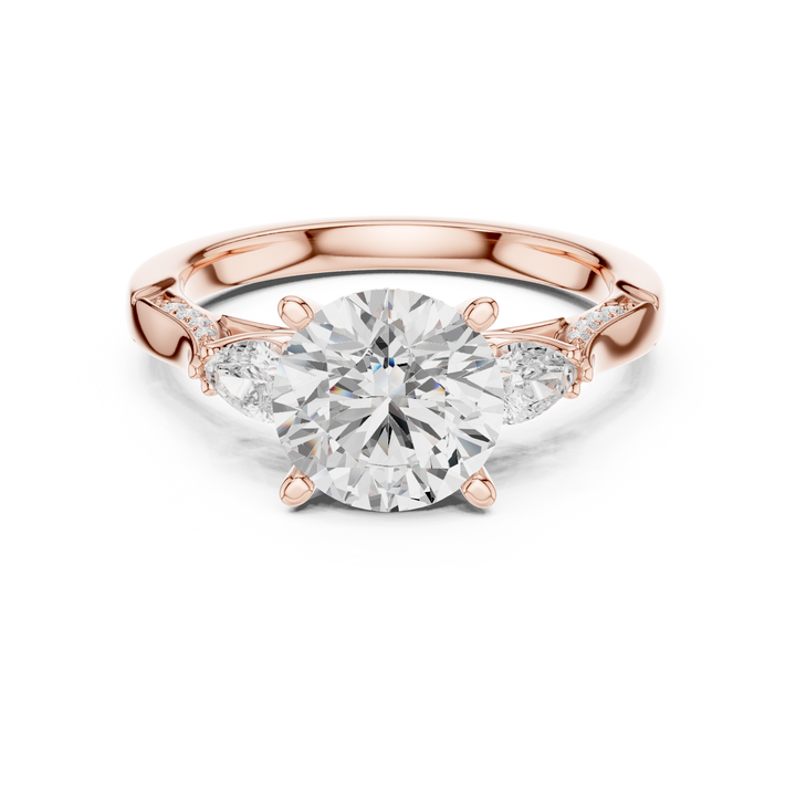 Timeless Round Cut Diamond Ring with Pear Side Stones accent stones classic look