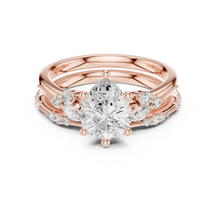 Pear Cut Diamond Solitaire Ring with Marquise Side Stones and Pavé Band