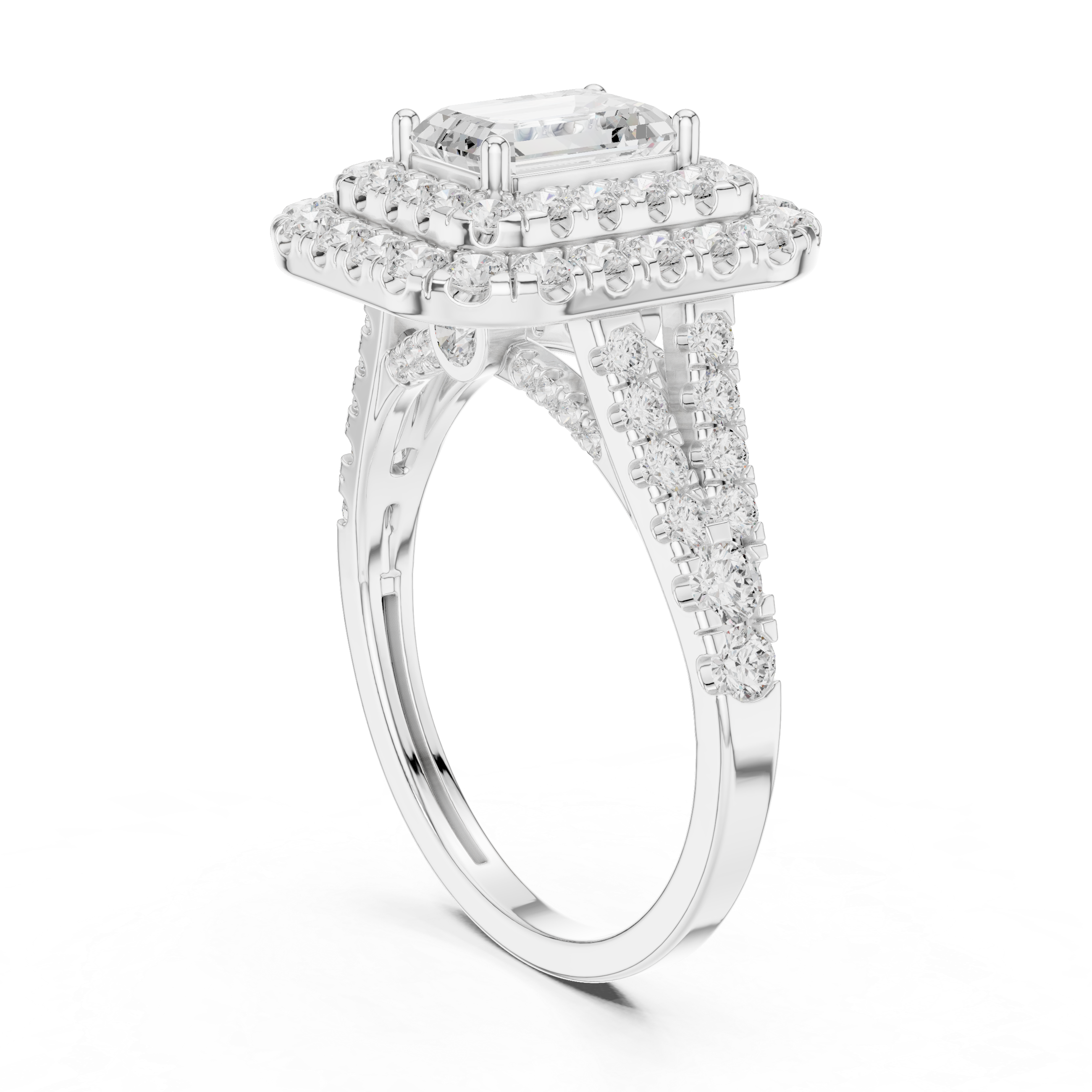 Emerald gemstone ring with polished band.