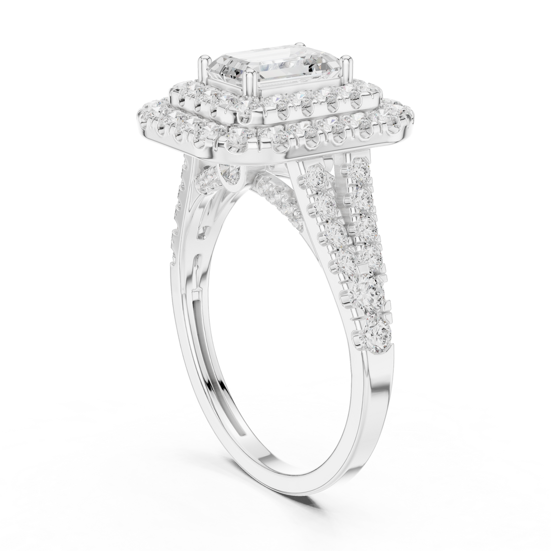 Emerald gemstone ring with polished band.