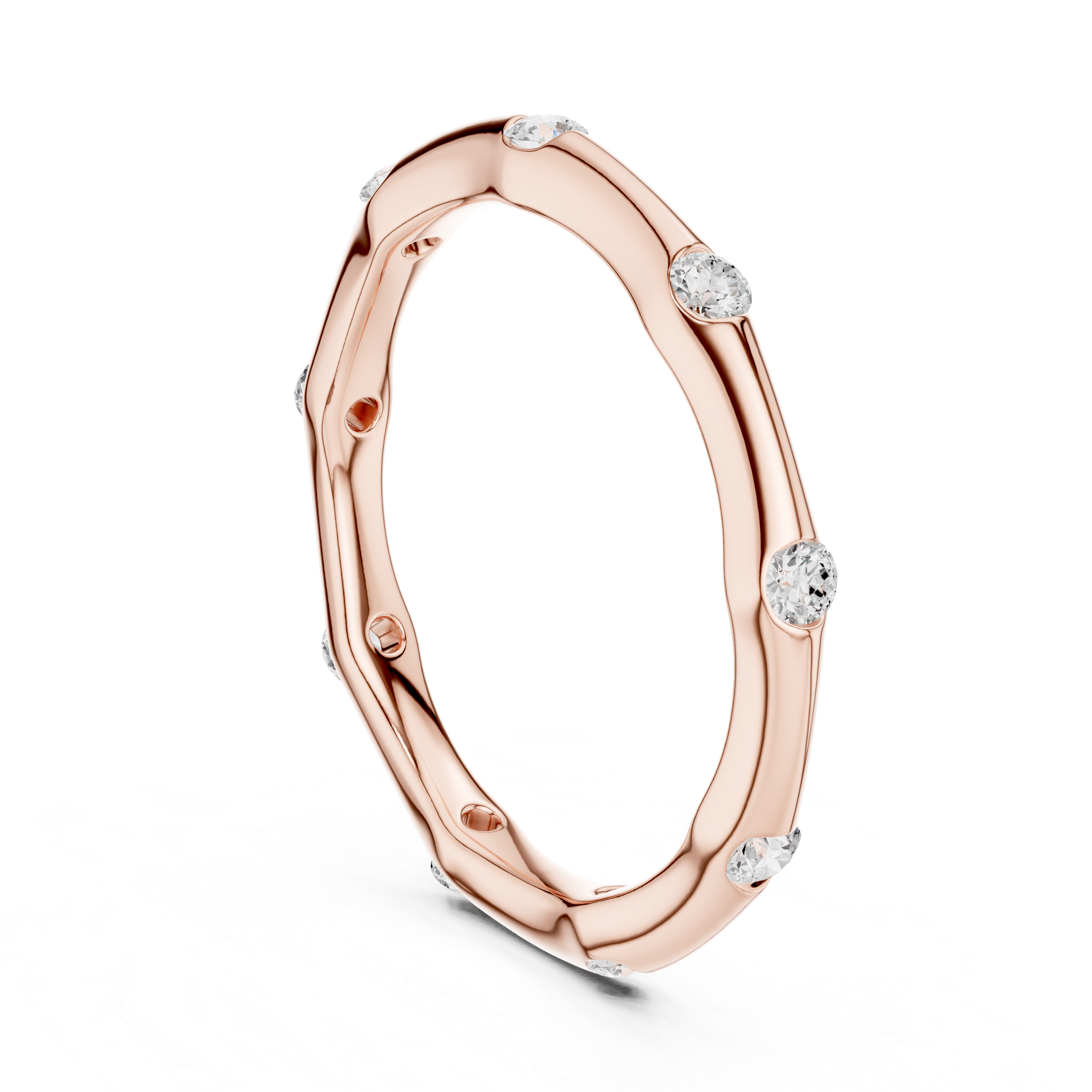 Decorative gold bangle with floral pattern.