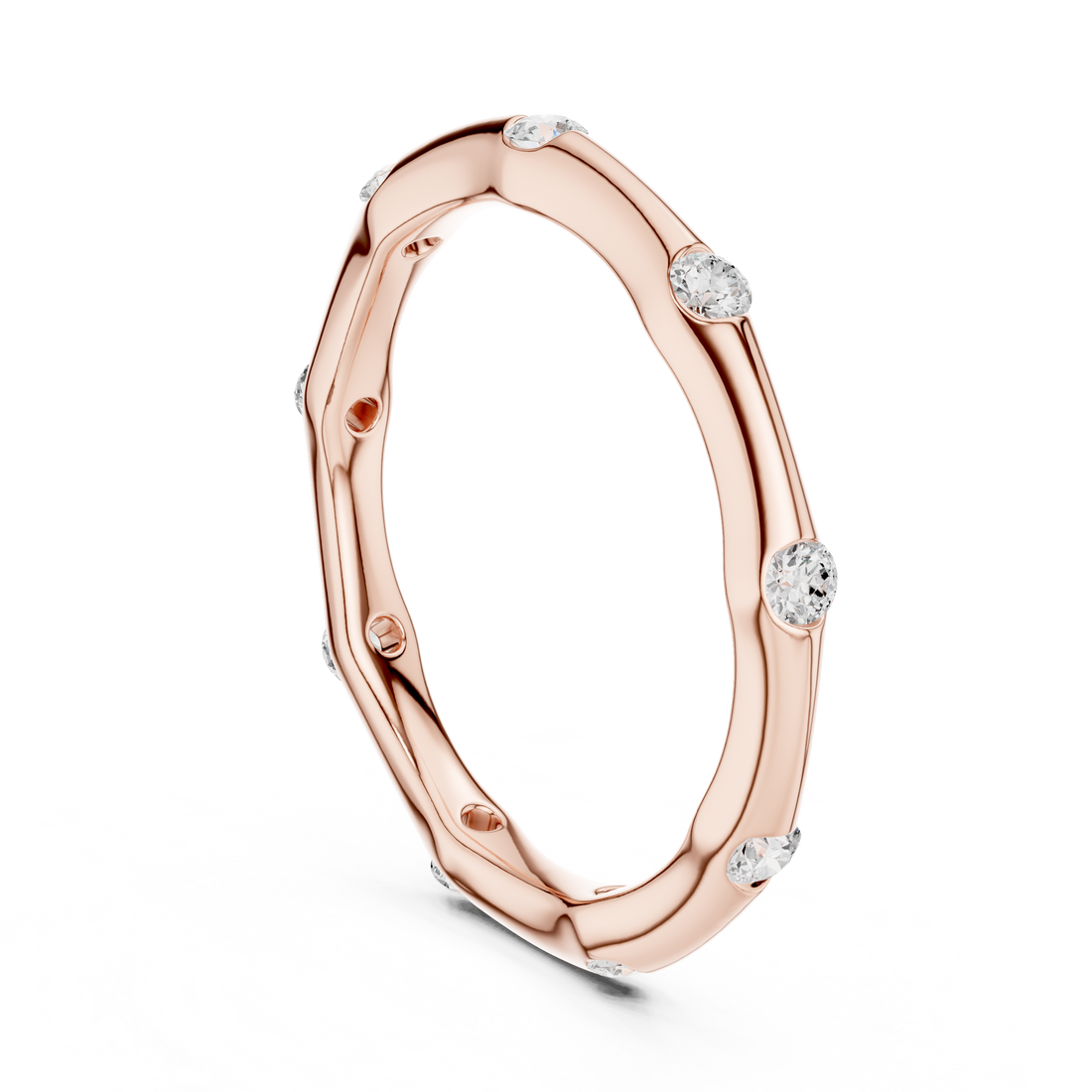 Decorative gold bangle with floral pattern.