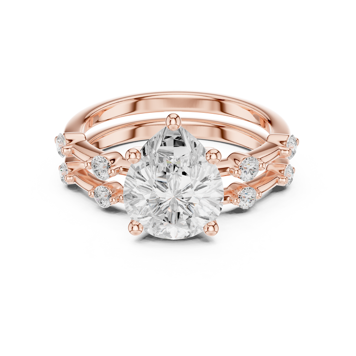 Minimalist Style Pear Cut Diamond Split Band Engagement Ring with Roun Side Stones perfect for everyday elegant simple wear