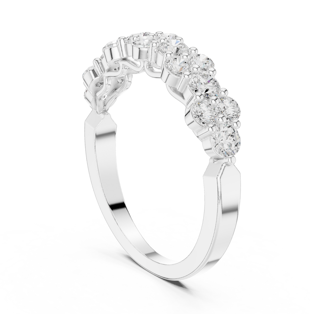 Emerald gemstone ring with polished band.