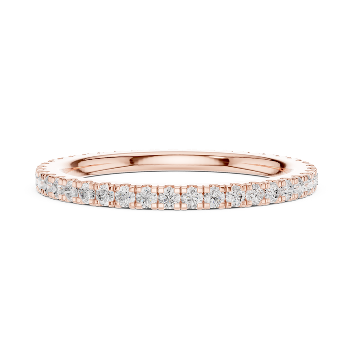 Trendy huggie earrings with compact circular shape and sparkling diamond detailing.