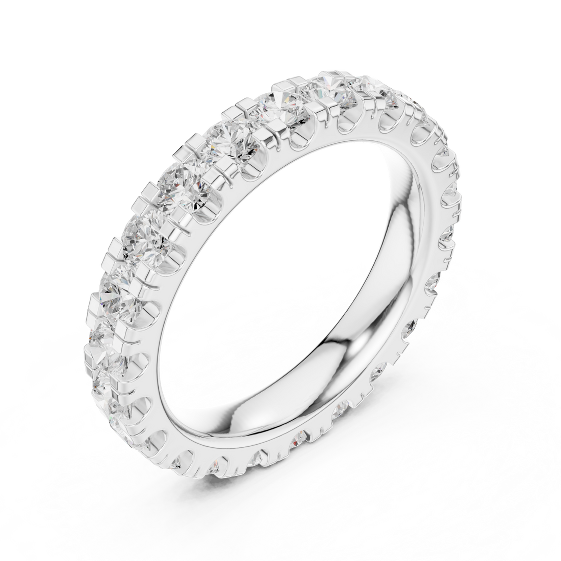 Beautiful white gold halo engagement ring featuring sparkling center diamond with pavé side stones.
