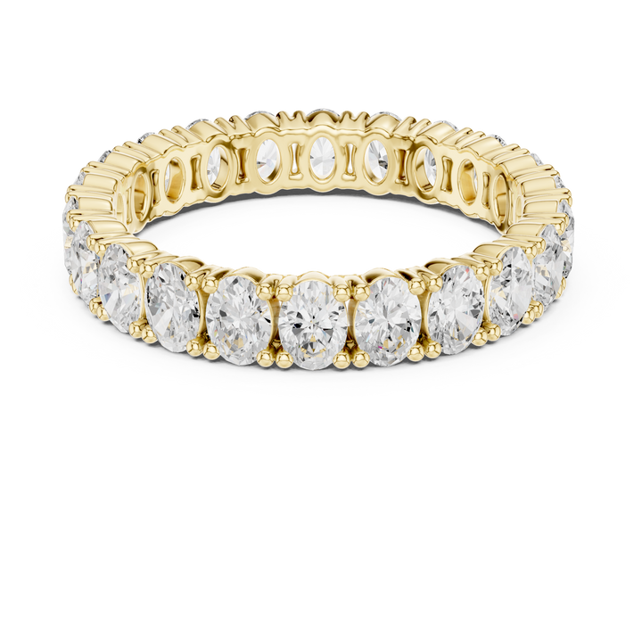 Classic yellow gold wedding band with smooth polished surface and timeless comfort fit design.