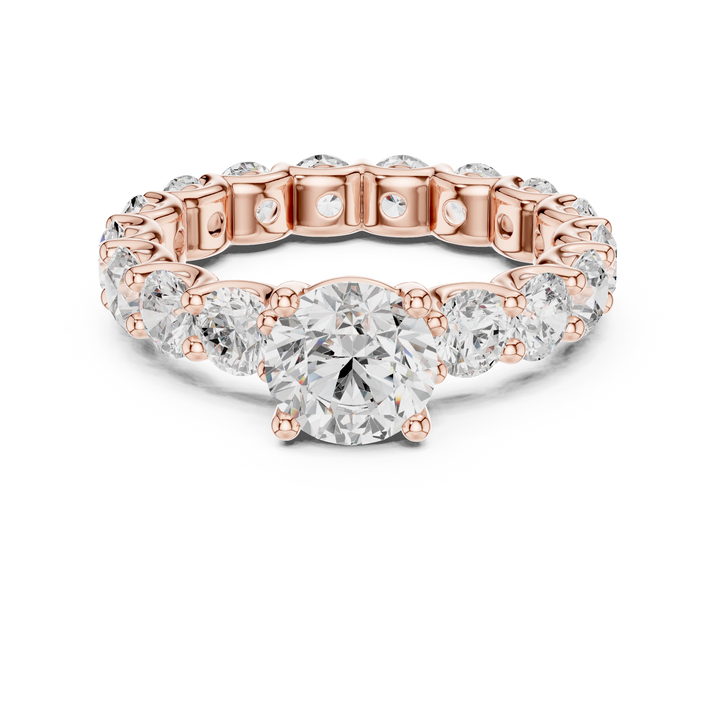 Elegant princess-cut diamond engagement ring with brilliant center stone and slim polished gold band.