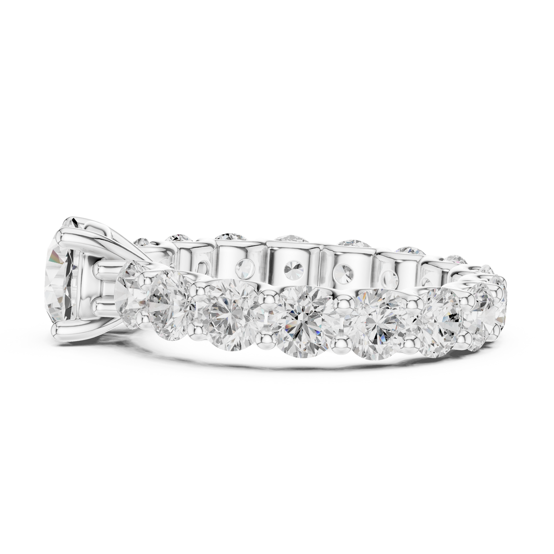 Luxury cluster diamond ring featuring multiple small stones forming dazzling centerpiece.