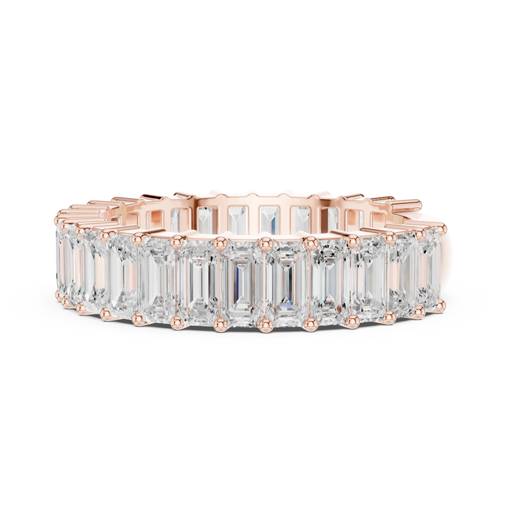 Designer men's gemstone ring featuring bold rectangular stone centerpiece.
