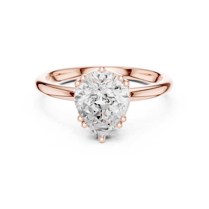 Elegant princess-cut diamond engagement ring with brilliant center stone and slim polished gold band.