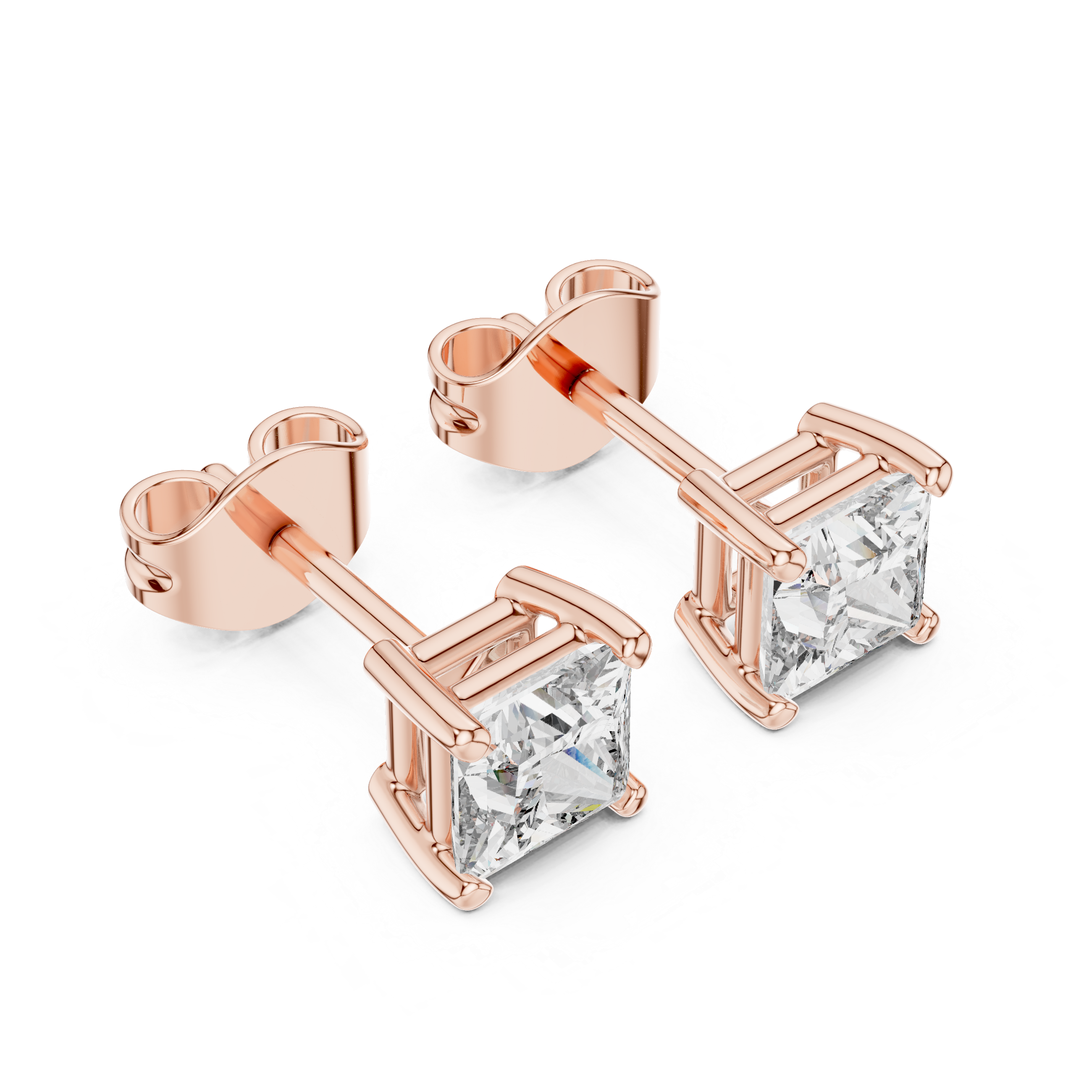 Small gold stud earrings with classic finish.