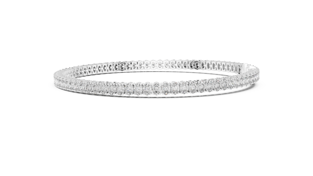 Oval Cut Diamond Classic Tennis Bracelet in Collet Settings