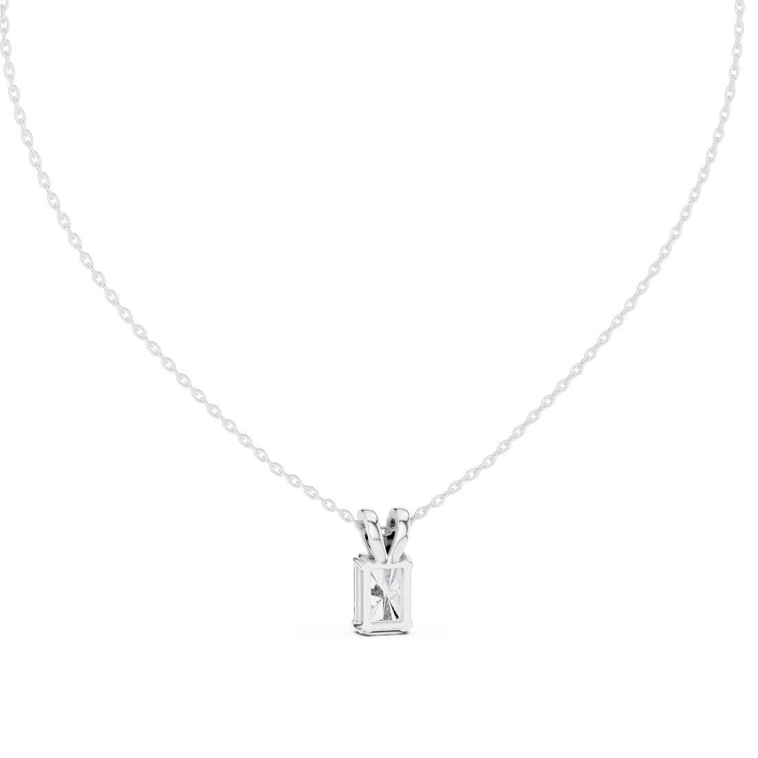 Elegant anklet featuring fine chain links with small hanging charms.