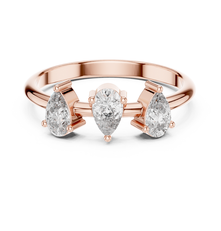 Pear Cut Diamond Three Stone Ring with Elegant Tapered Trio Design