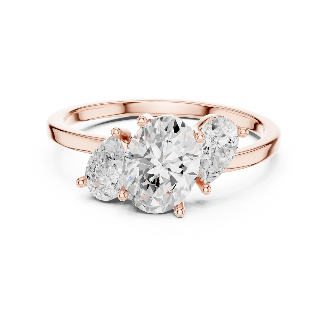 Oval and Pear Three Stone Diamond Ring with Classic Elegance