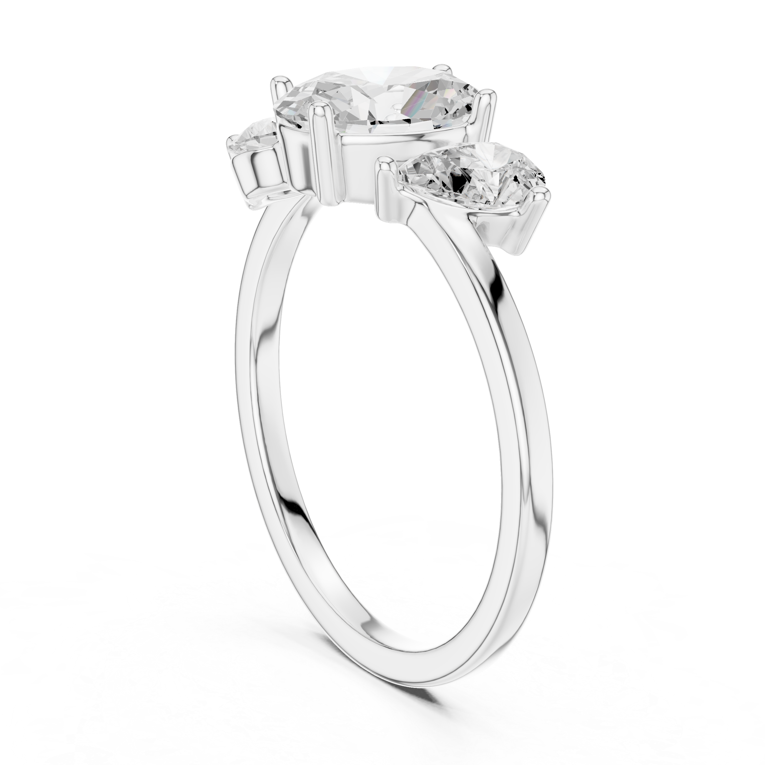 Oval and Pear Three Stone Diamond Ring with Classic Elegance