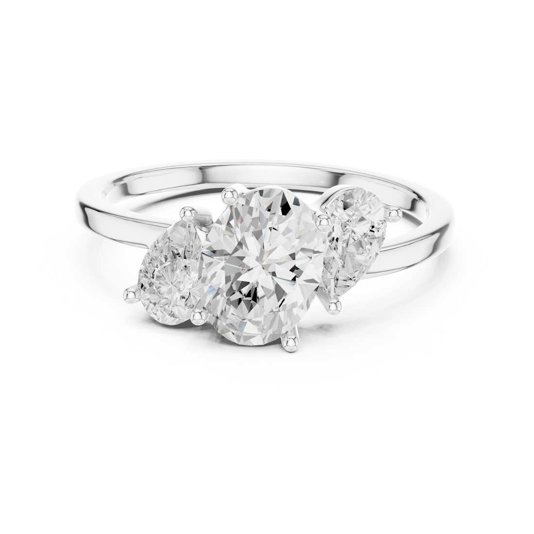 Oval and Pear Three Stone Diamond Ring with Classic Elegance