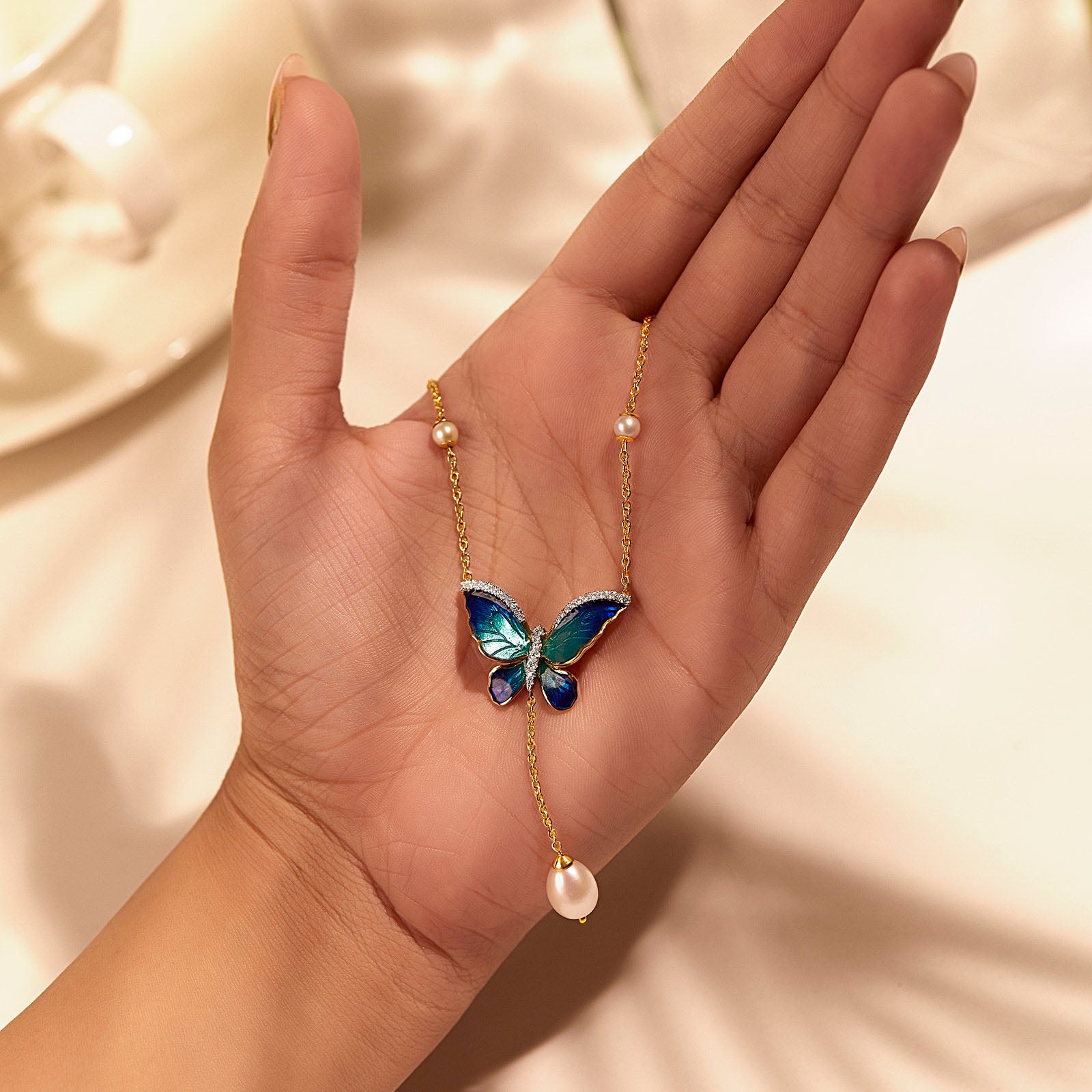 Flared Blue Butterfly Pearl Necklace