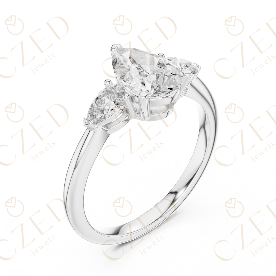 Pear Cut Diamond Three Stone Ring with Tapered Side Stones