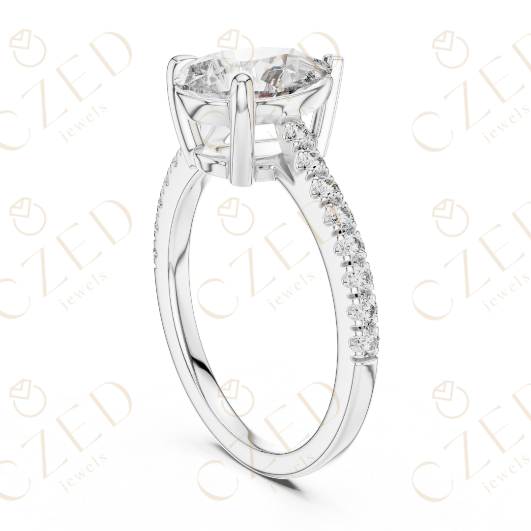 Pear Cut Diamond Solitaire Ring with Elegant Pave Side Stones