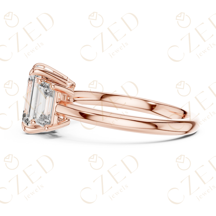 Emerald Cut Three Stone Diamond Ring with Classic Prong Setting